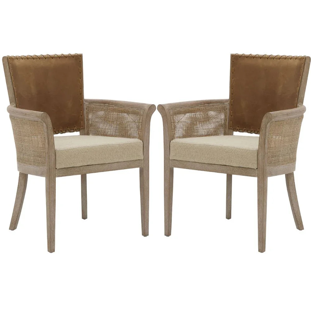 Fauteuil à dossier en cuir cousu et accoudoirs en rotin