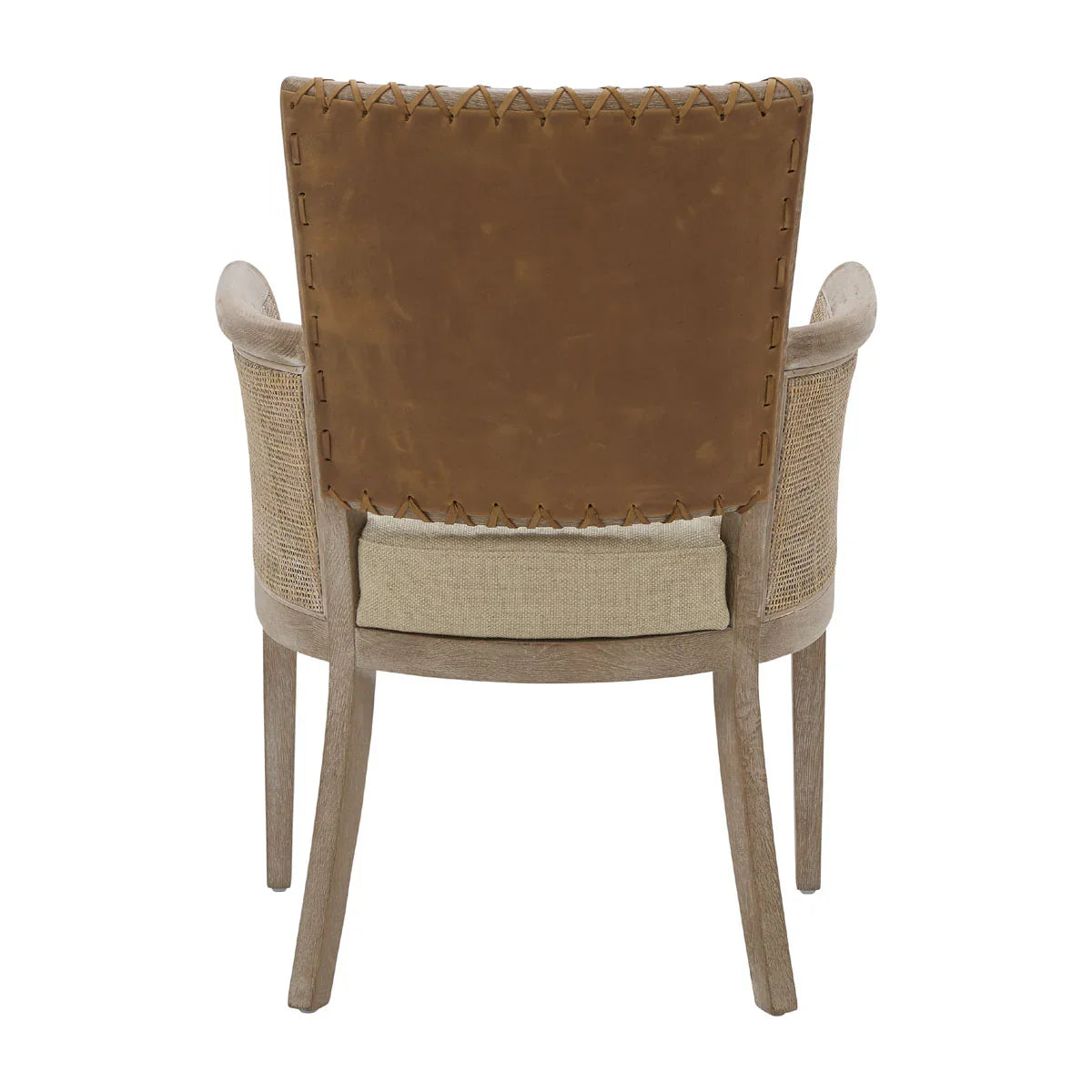 Fauteuil à dossier en cuir cousu et accoudoirs en rotin 