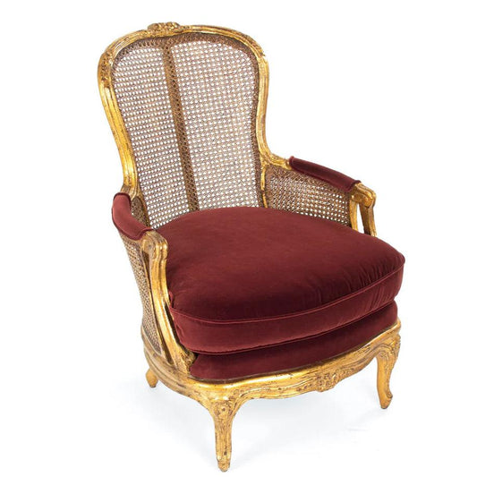 Fauteuil luxueux en rotin doré français avec coussin en velours rouge