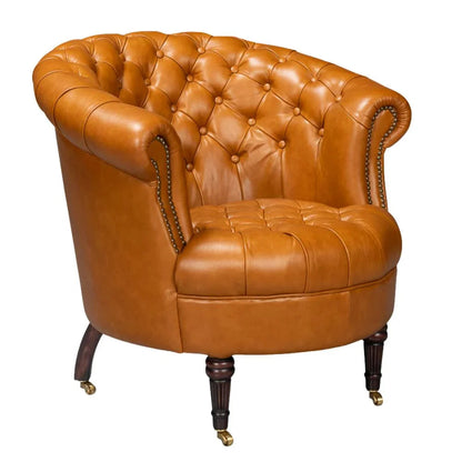 Fauteuil Chesterfield en cuir marron doré