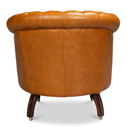 Fauteuil Chesterfield en cuir marron doré