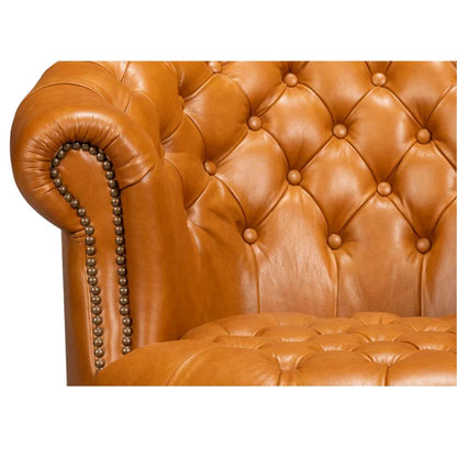 Fauteuil Chesterfield en cuir marron doré