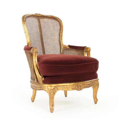 Fauteuil luxueux en rotin doré français avec coussin en velours rouge