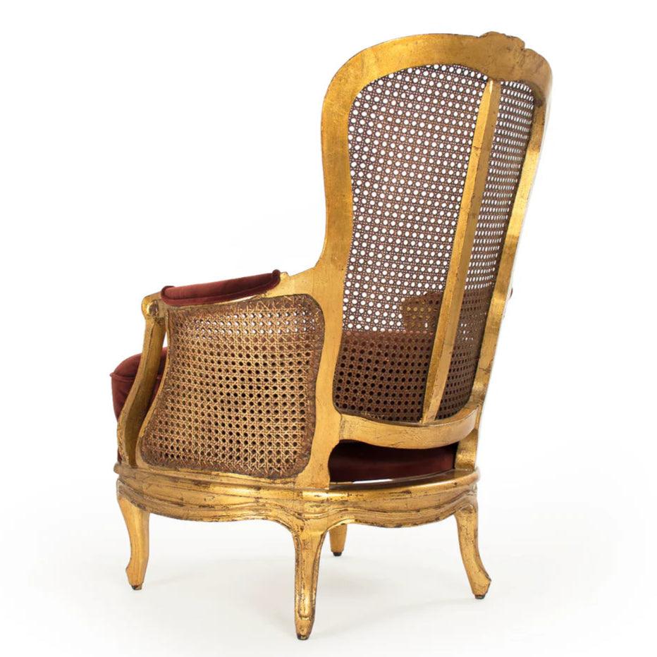 Fauteuil luxueux en rotin doré français avec coussin en velours rouge